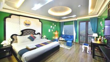 Suite, Balcony, Mountain View | Minibar, in-room safe, desk, laptop workspace