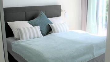 2 bedrooms, desk, iron/ironing board, travel cot