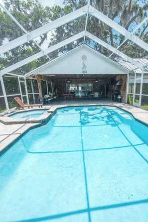 Indoor pool, a heated pool - Sunset River House - Home w/Pontoon Boat for rent. Private Dock. Sleeps 12 (Port Richey)