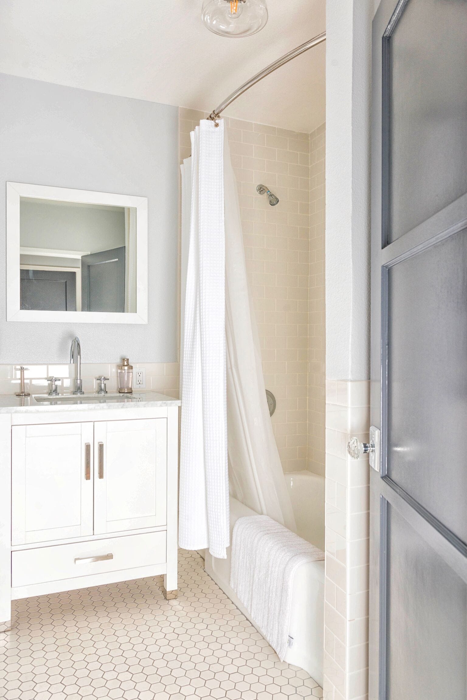 Combined shower/tub, hair dryer, towels, soap