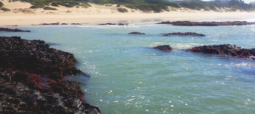 TRANQUIL BEACH SETTING CLOSE TO WORLD FAMOUS SURFING VENUES AND AIRPORT.