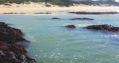 TRANQUIL BEACH SETTING CLOSE TO WORLD FAMOUS SURFING VENUES AND AIRPORT.