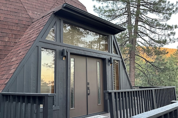 We painted it black! Beautiful new front doors and exterior paint