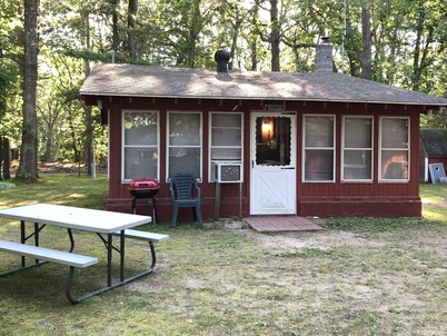 Cozy "Up North" Cabin in the woods with Pentwater Lake frontage and access