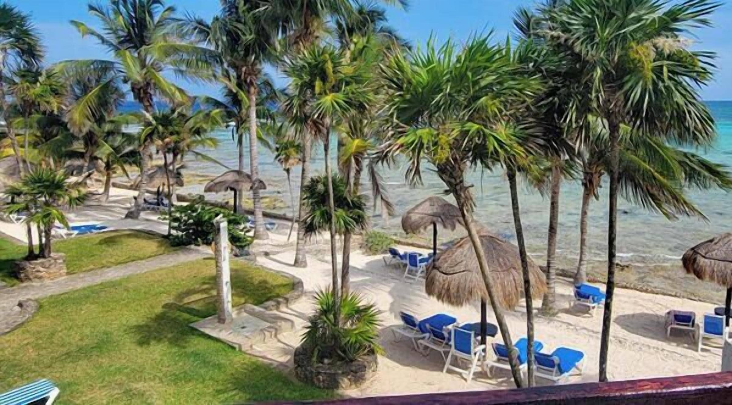 On the beach, sun-loungers, beach towels