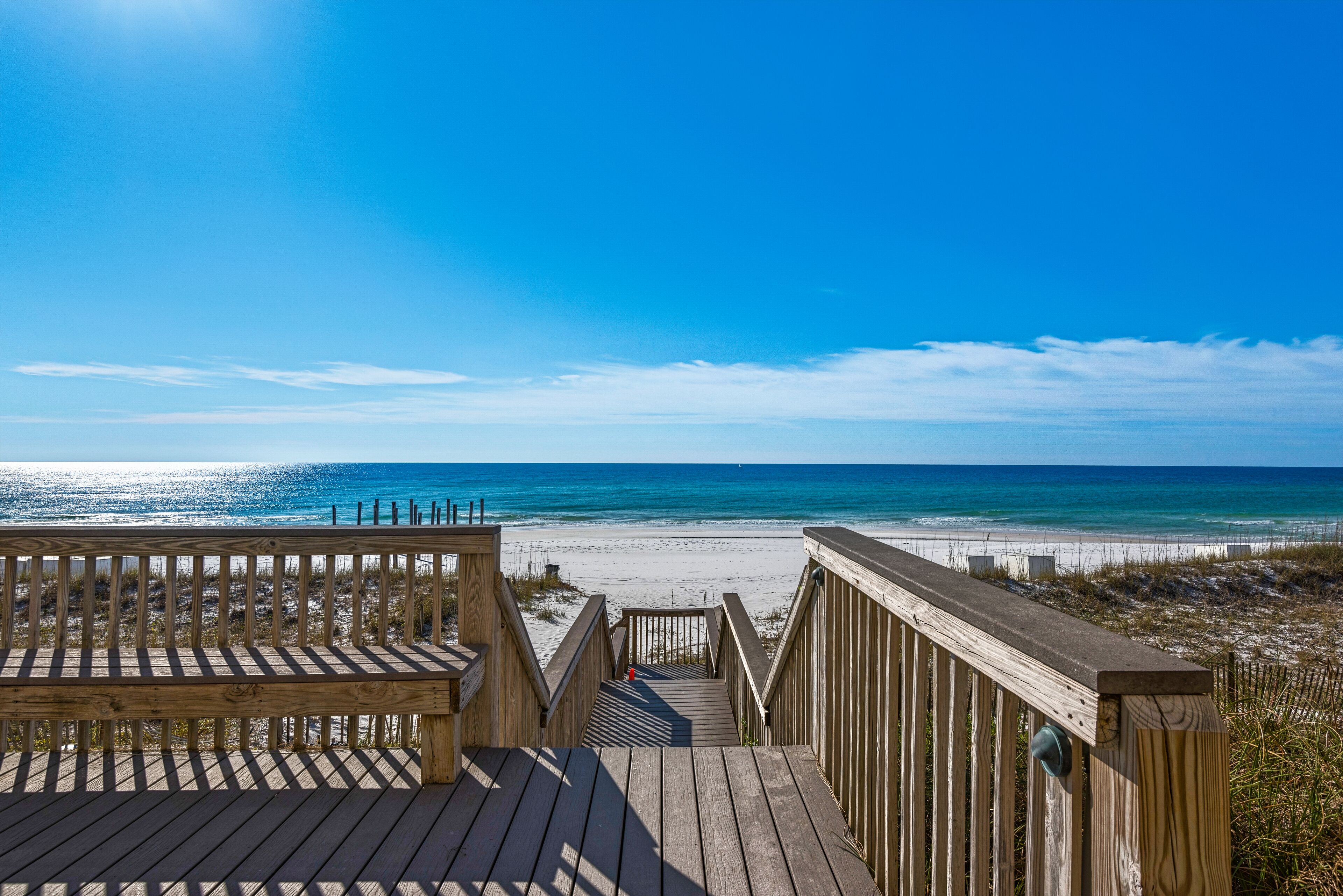 On the beach, sun-loungers