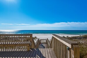 On the beach, sun-loungers
