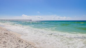 On the beach, sun-loungers