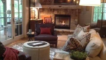 Smart TV, fireplace, DVD player, books