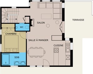 A floor plan with a bedroom, bathroom, kitchen, dining area, living room, and terrace.