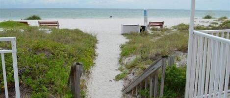 On the beach, sun-loungers, beach towels