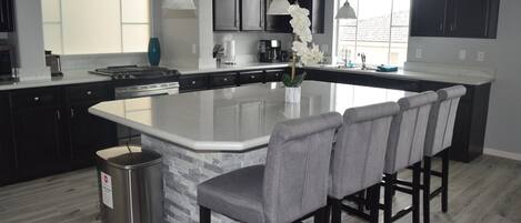 Coffee/tea maker, fridge, microwave, oven