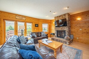 Smart TV, fireplace, table football, books