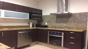 Fridge, microwave, oven, stovetop - Great! New Spacious 3BR Beachfront Condo in Pearl Tower (Villas del Mar)
