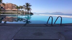 Outdoor pool, a heated pool - Great! New Spacious 3BR Beachfront Condo in Pearl Tower (Villas del Mar)