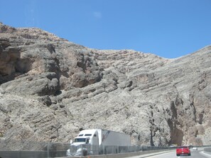 A highway with a rocky mountain backdrop. - Mesquite Nevada Condominium Vacation Rental Ground Level (Mesquite)