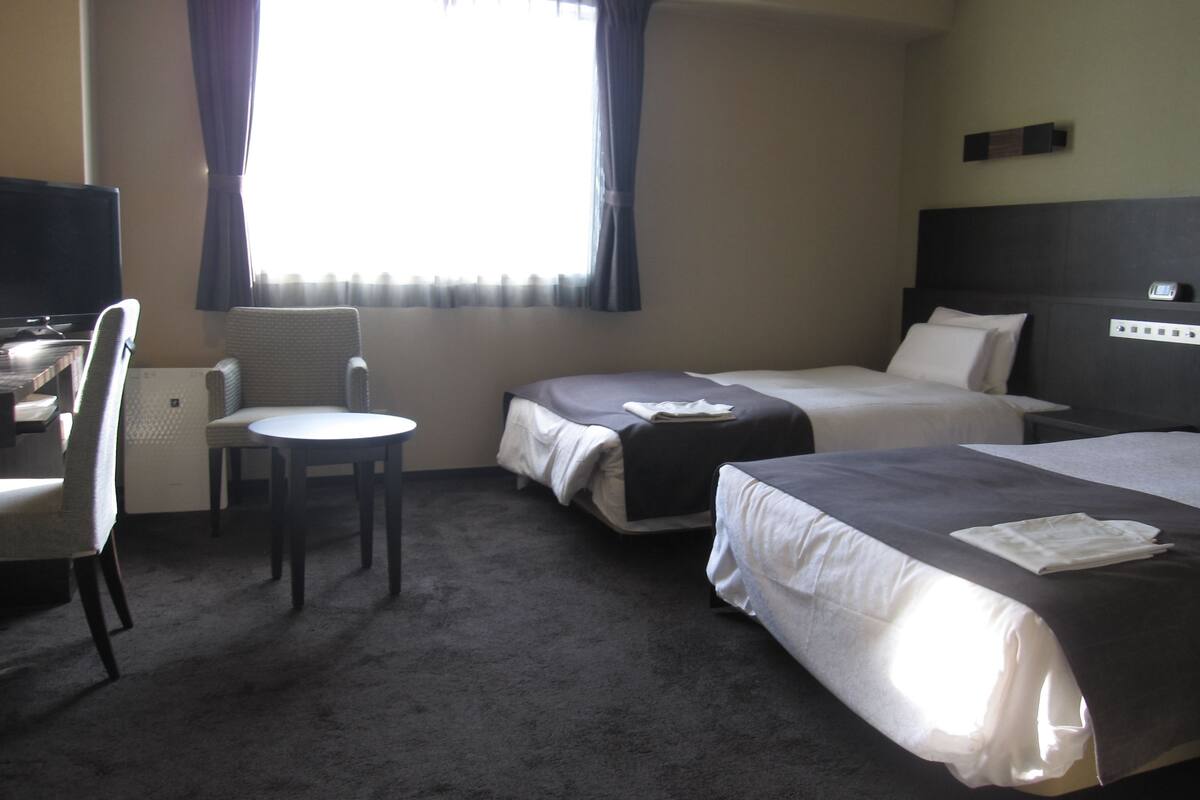 desk, blackout curtains, iron/ironing board, free wifi