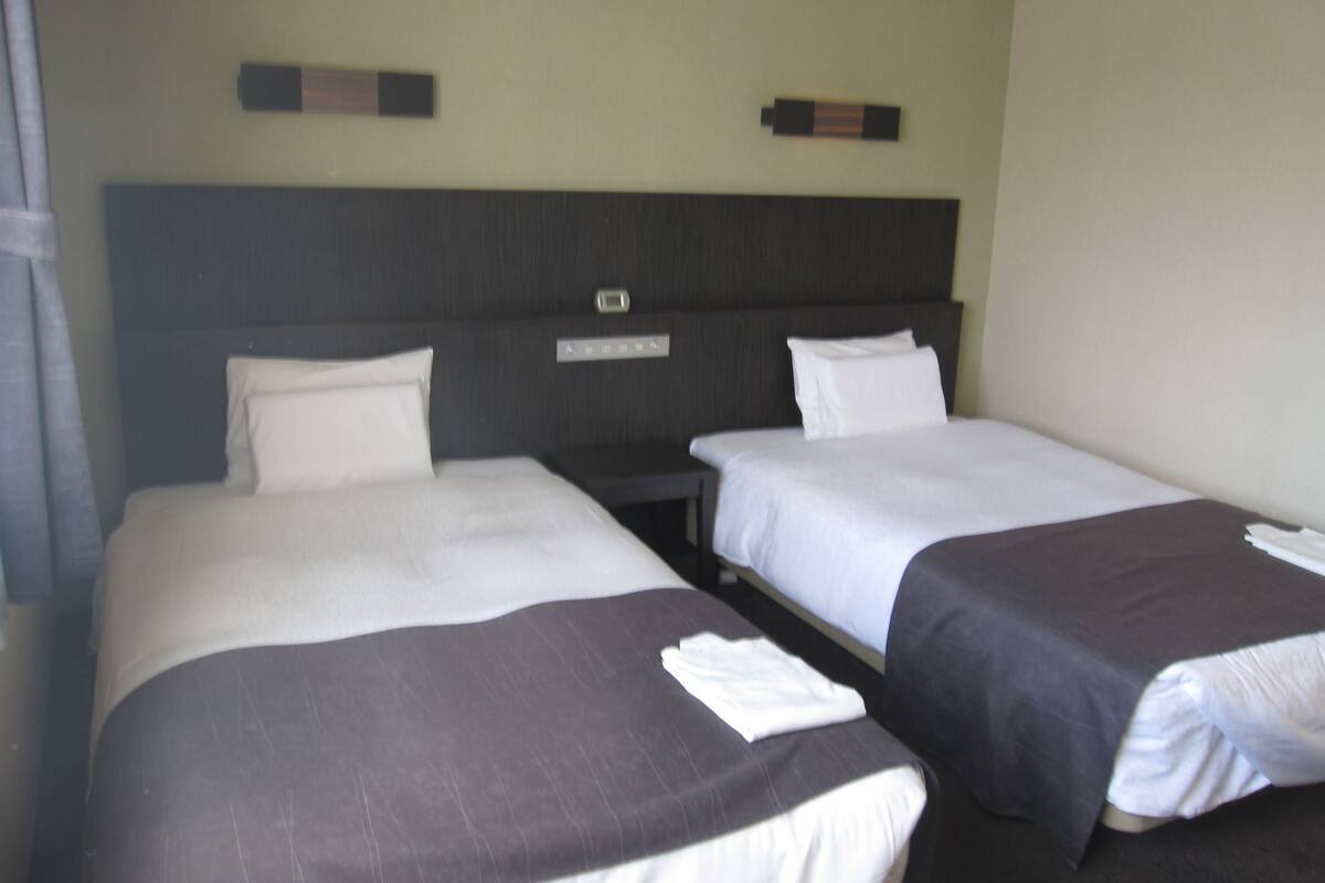 desk, blackout curtains, iron/ironing board, free wifi