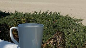 On the beach, sun loungers, beach towels