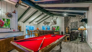 Living room with pool table