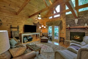 Smart TV, fireplace, foosball, books