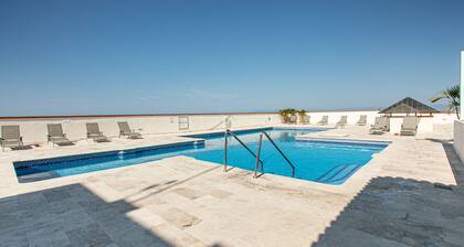 Check out the new bathrooms in this Ocean Front Condo # 409 with Roof top Pool