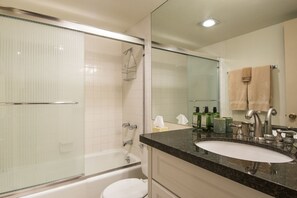 Combined shower/tub, hair dryer, towels, soap