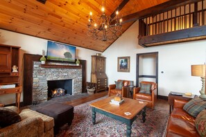 TV, fireplace, books, stereo