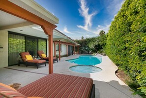 Outdoor pool, a heated pool, pool loungers