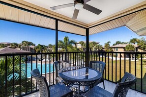 Outdoor dining - Blind Pass Condos at Bowman's Beach C210 on beautiful Sanibel Island (Sanibel Island)