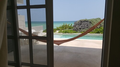 In front of the beach with power and wifi included! 