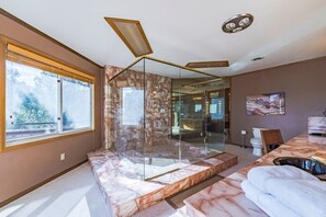 Combined shower/tub, hair dryer, towels, soap