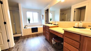 Combined shower/tub, hair dryer, towels, soap