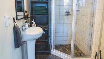 Shower, eco-friendly toiletries, hair dryer, towels