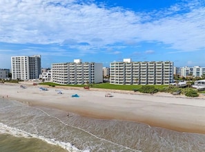 On the beach, sun loungers, beach towels