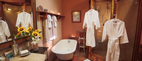 Bathtub, hair dryer, towels, soap