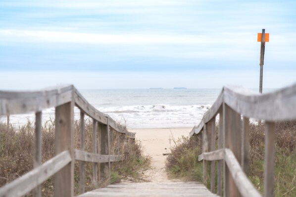 On the beach, sun-loungers, beach towels