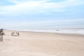 On the beach, sun loungers, beach towels