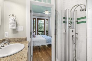 Bathtub, hair dryer, towels, soap