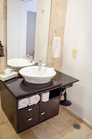 Bathtub, hair dryer, towels, soap