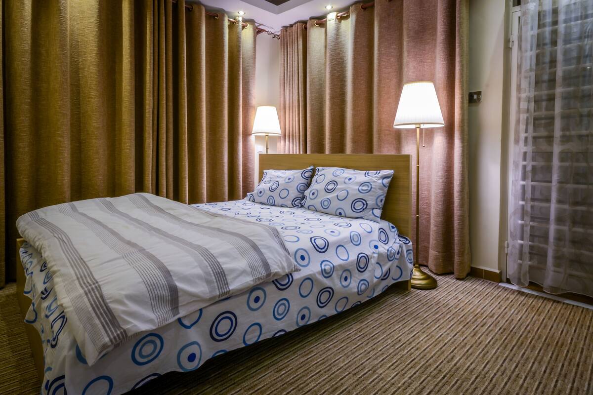 Apartment, 2 Bedrooms | Soundproofing, iron/ironing board, cribs (free), WiFi (free)