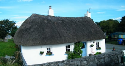 Beautiful 200 year old Irish Thatched listed cottage restored to original.