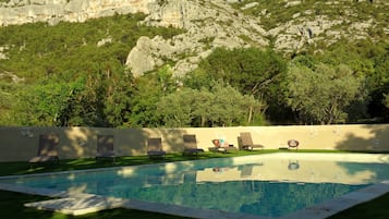 Seasonal outdoor pool, pool umbrellas, sun loungers