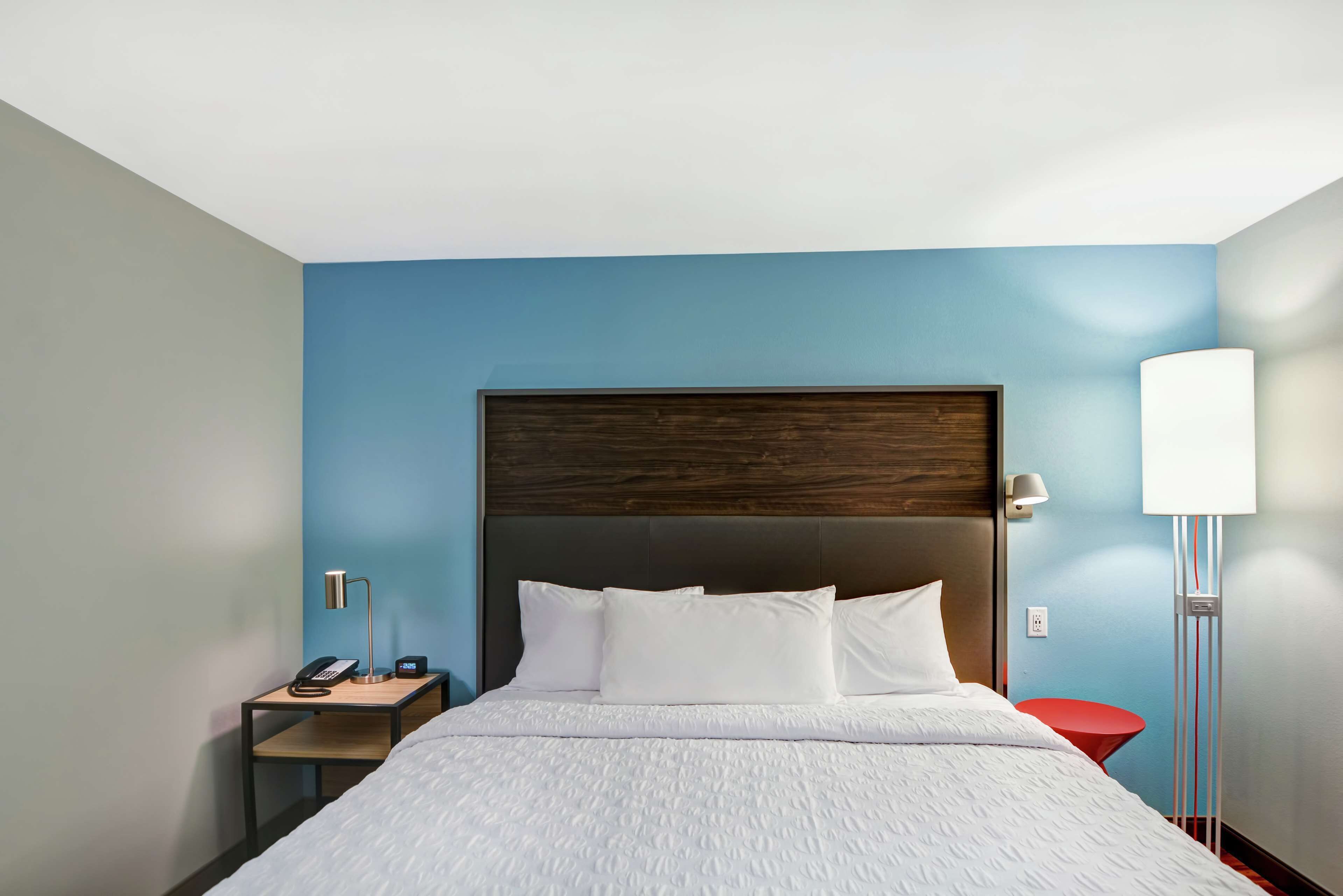 desk, laptop workspace, blackout curtains, iron/ironing board