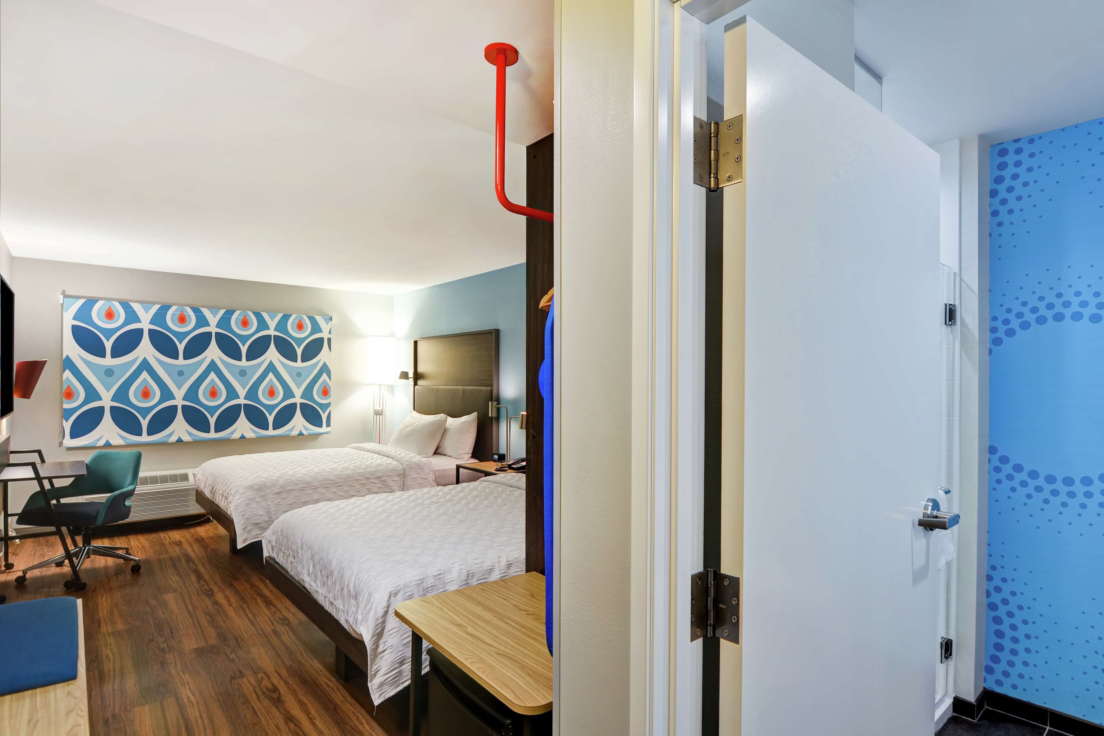 desk, laptop workspace, blackout curtains, iron/ironing board