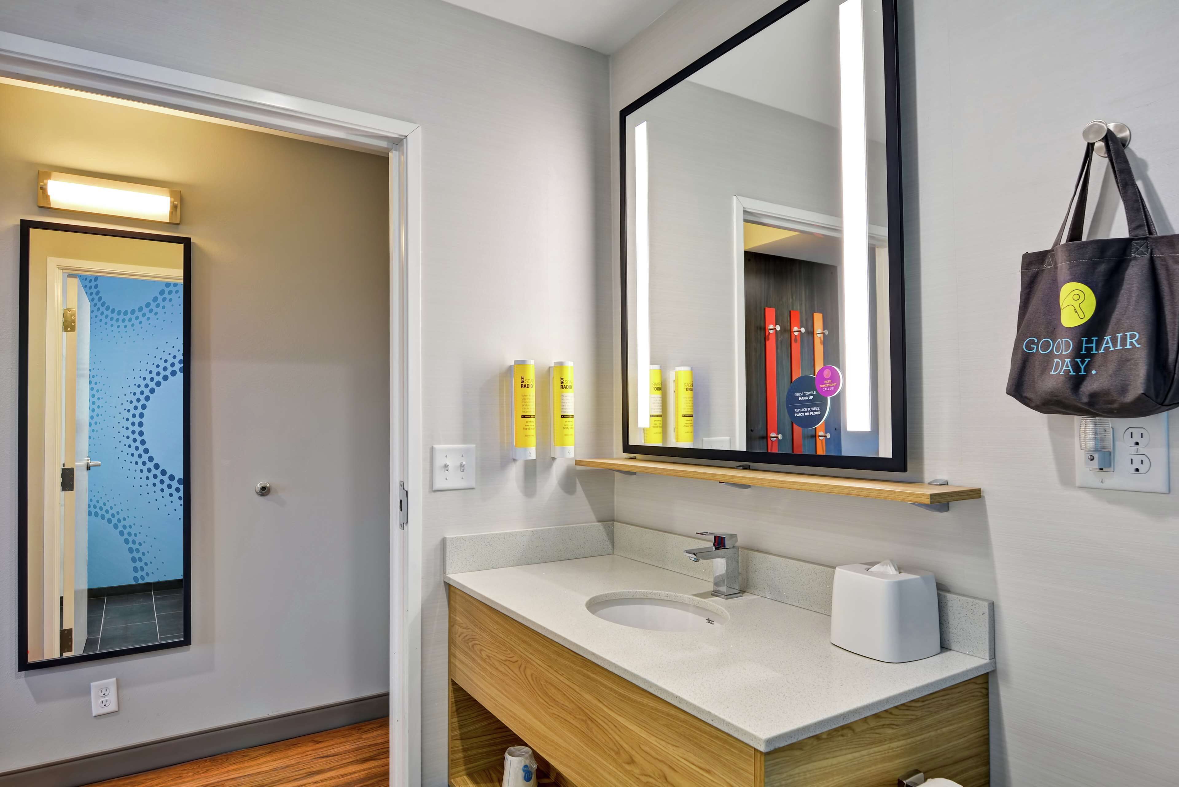 hair dryer, bathrobes, towels, soap