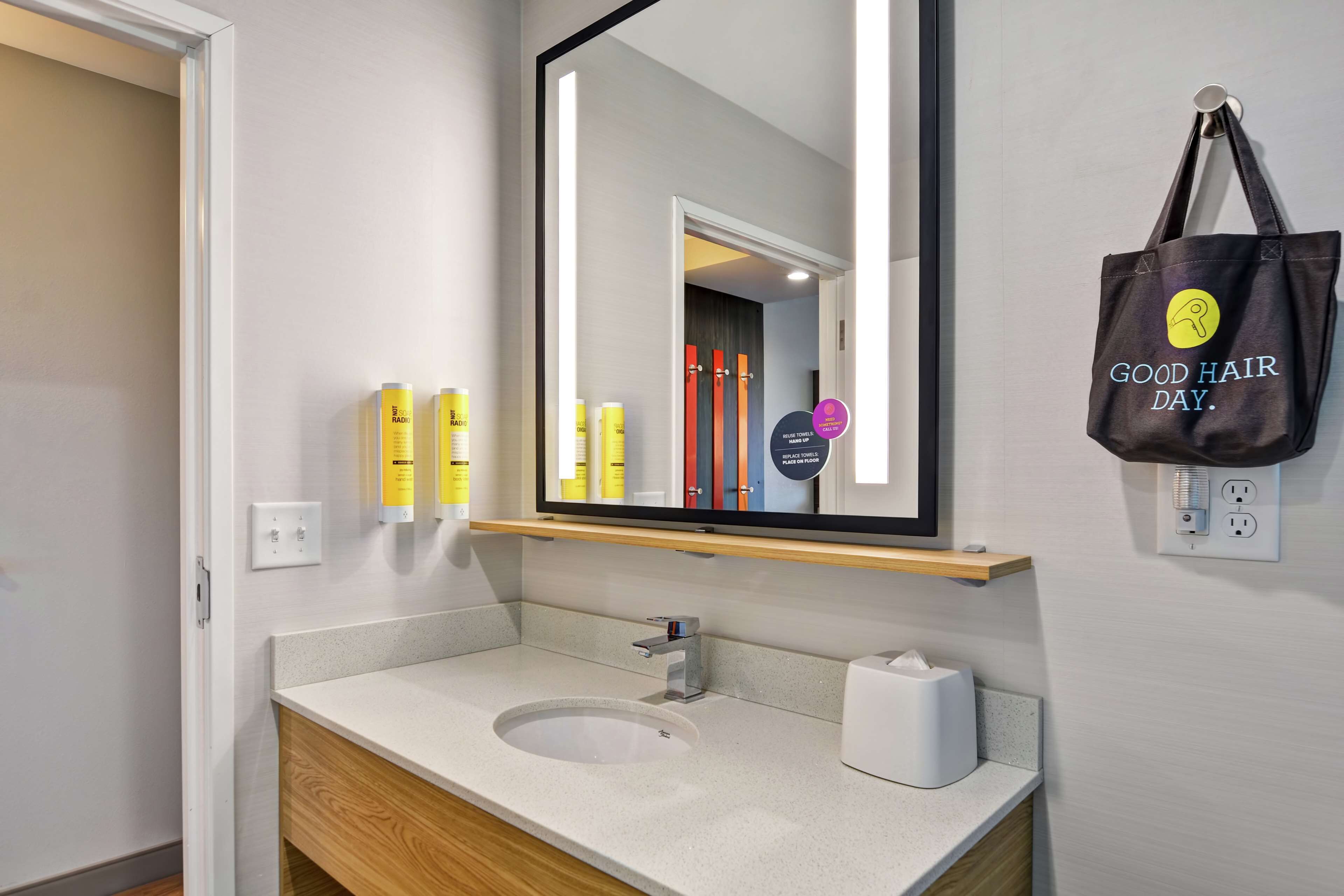 hair dryer, bathrobes, towels, soap