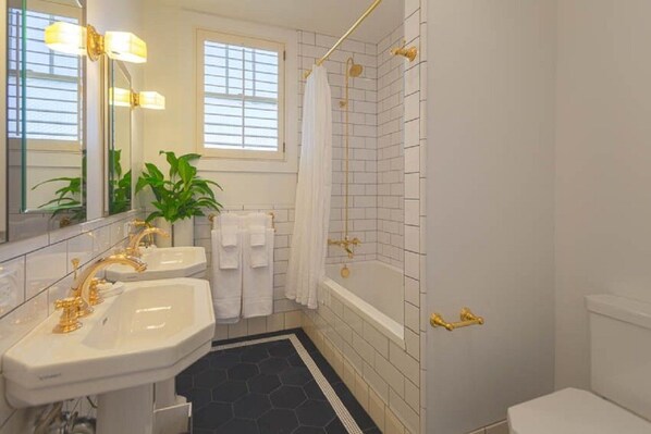 Hair dryer, towels, soap, toilet paper