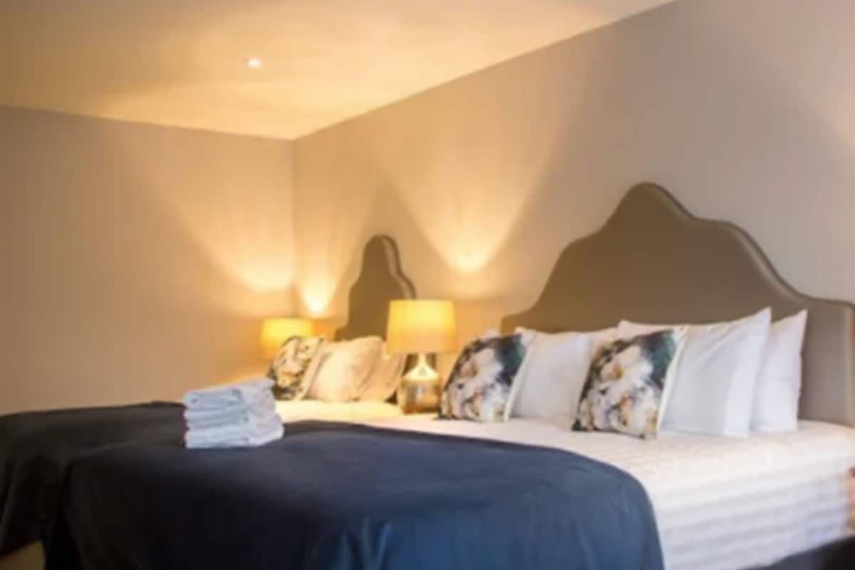 superior family room | premium bedding, select comfort beds, in-room safe