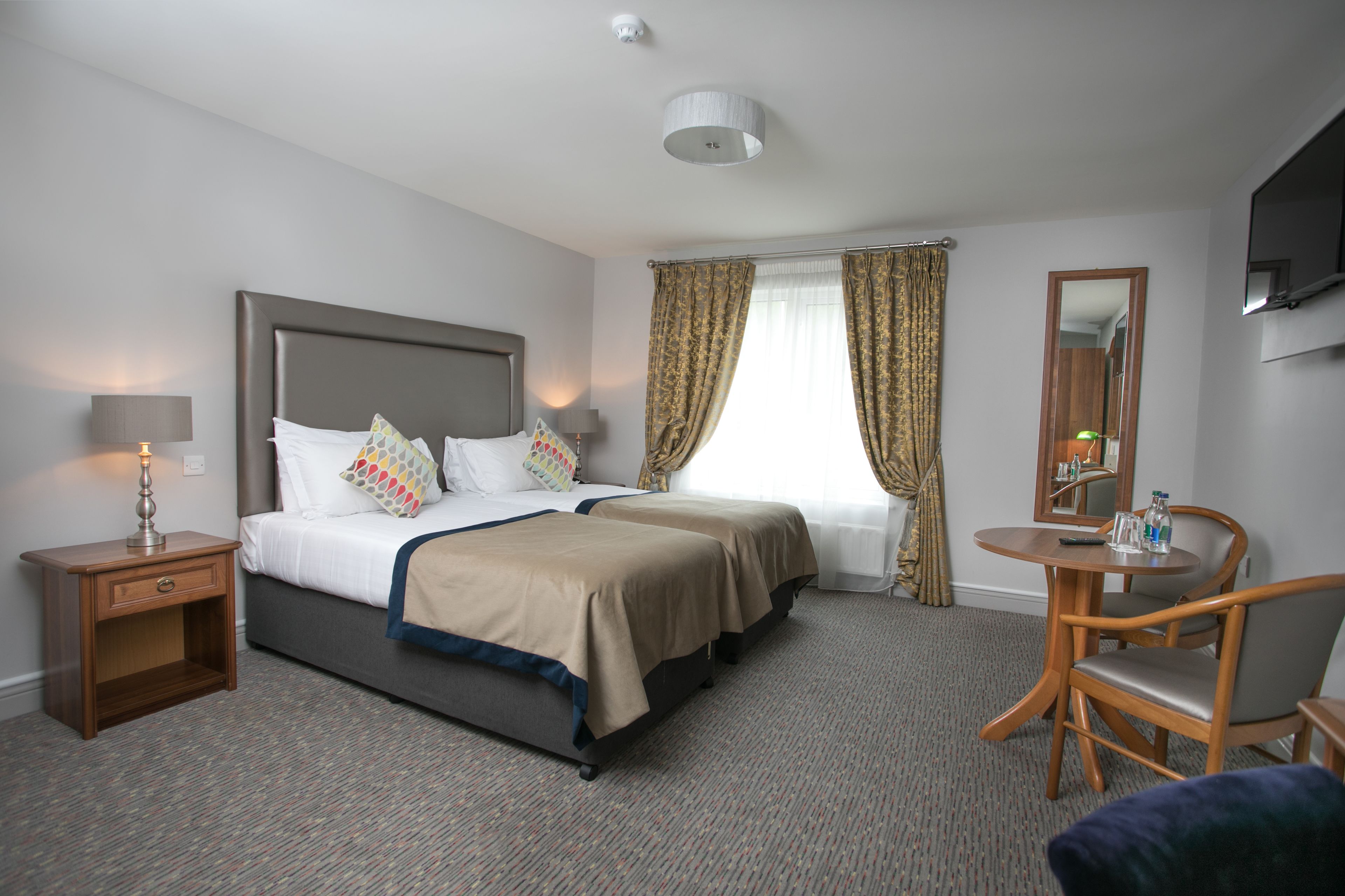 superior twin room | premium bedding, select comfort beds, in-room safe